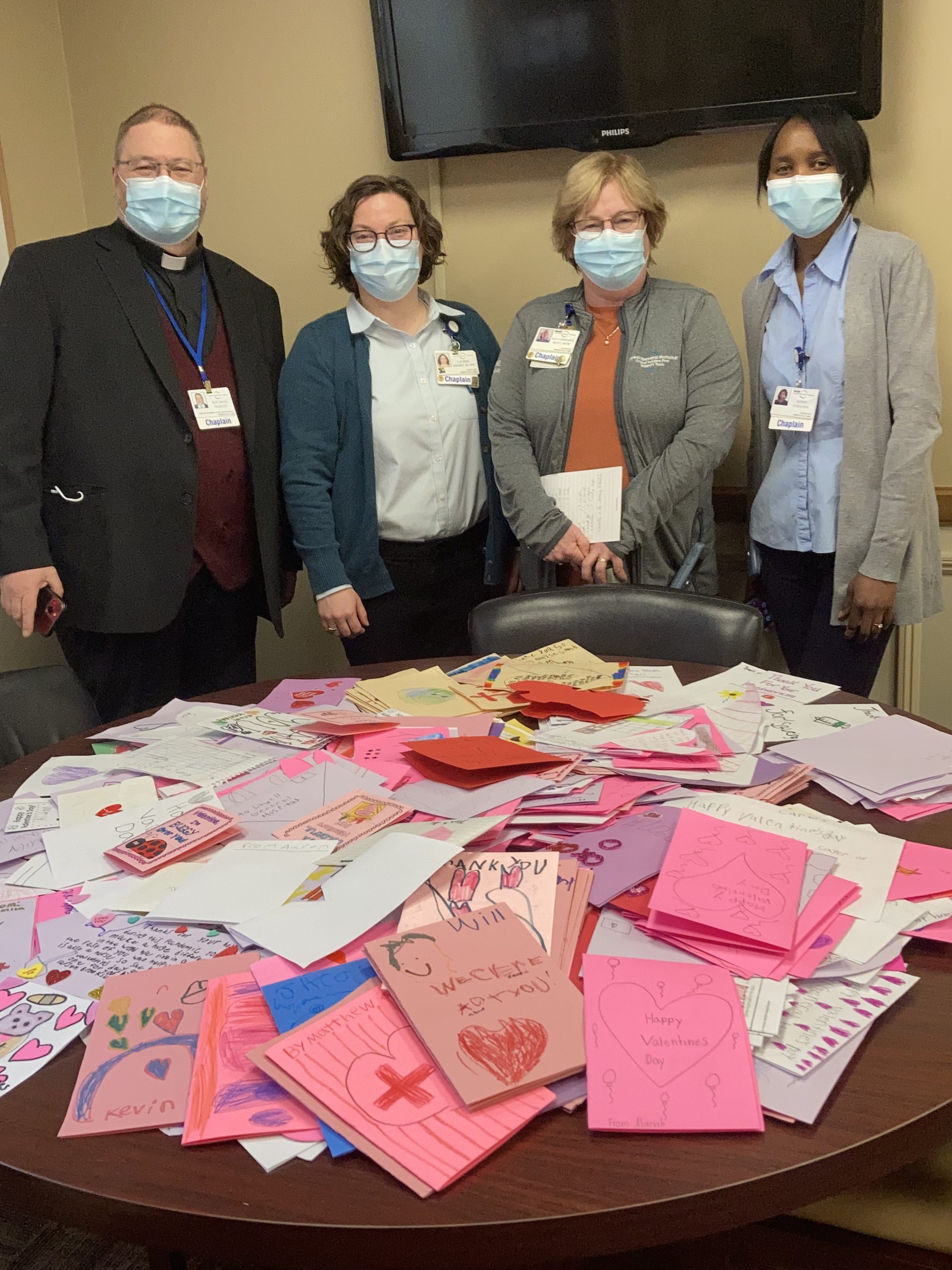 Spiritual Care Dept at Lowell General Hospital receiving the Cards of Appreciation & Love - Left to right: Dean Shapley, Lauren Rigsby, Lynne Cole, Agnes Nabadda